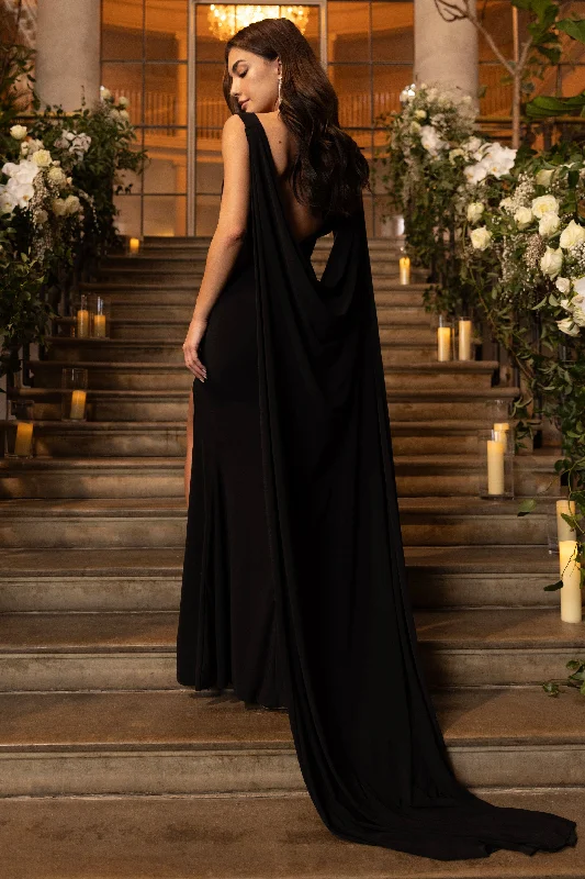 A Toast | Black Split Maxi Dress With Draped Cape Trendy Off-Shoulder Ruffle Maxi Dress A Toast | Black Split Maxi Dress With Draped Cape Trendy Off-Shoulder Ruffle Maxi Dress